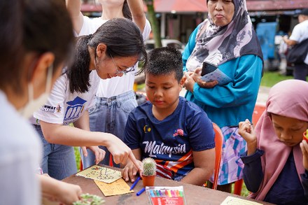 Sunway University students participating in community activities